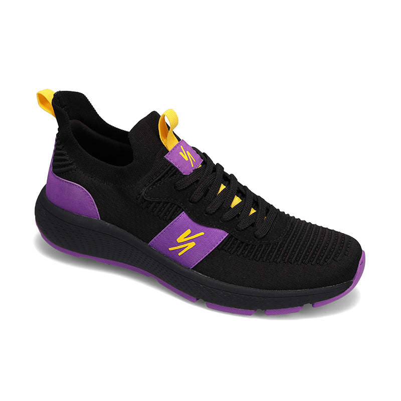 Angled side view of RIVAL Men's Reign sneaker in black/purple/yellow.