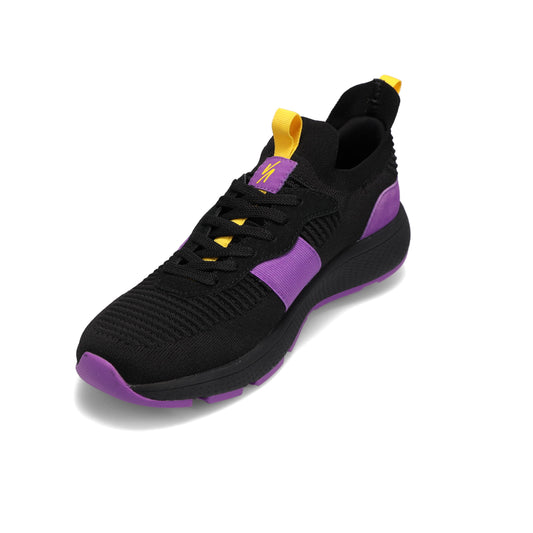 Angled front view of RIVAL Men's Reign sneaker in black/purple/yellow.