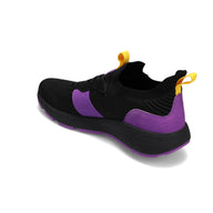 Angled back view of RIVAL Men's Reign sneaker in black/purple/yellow.