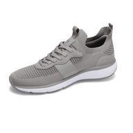 Angled side view of RIVAL Men's Reign Sneaker in Grey.